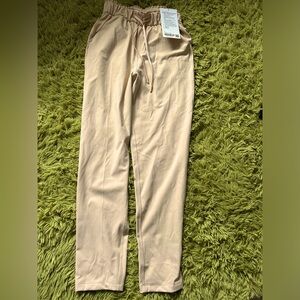 Brand new: Size 2 Lululemon Stretch High Rise 7/8 Pant (color: Prosecco)